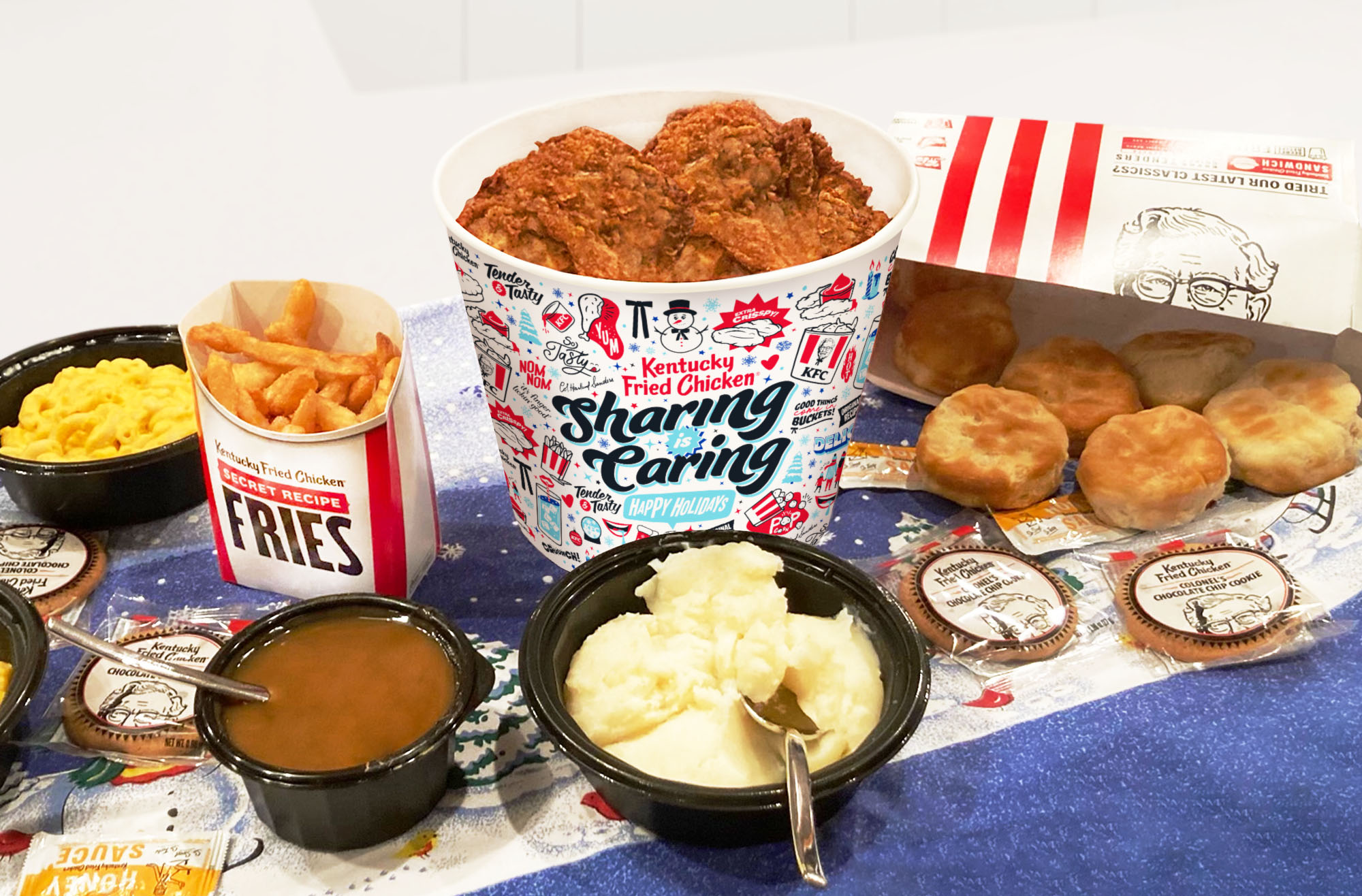 KFC Sharing is Caring Holiday Bucket. KFC meal shared with the family during the holidays. Packaging design by Allan Chan.